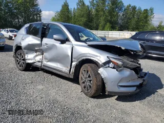 2018 Mazda CX-5 Grand Touring с VIN JM3KFBDM5J0323923, выставлен на аукционе Copart как лот 58162435 с пробегом 144 792 миль миль и Списание • Salvage title. История ставок и продаж доступна на DreamBid. Изображение 4.