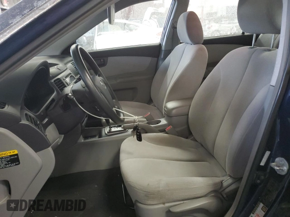 2007 Kia Optima EX with VIN KNAGE124275159540, listed as a Copart auction lot 46324655 with 184,036 mi miles and Salvage Title. Bid and sale history available at carsss.com. Image 7.