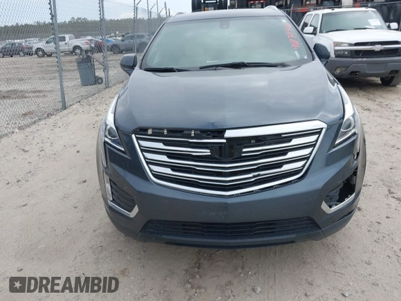 2019 Cadillac XT5 FWD with VIN 1GYKNARS5KZ220991, listed as a IAAI auction lot 41838908 with 75,730 mi miles and . Bid and sale history available at DreamBid. Image 8.