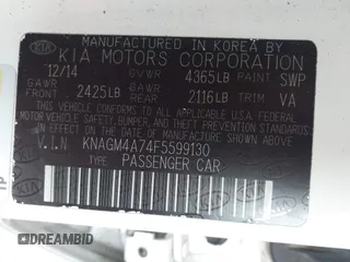 2015 Kia Optima LX with VIN KNAGM4A74F5599130, listed as a IAAI auction lot 42037576 with 177,067 mi miles. Bid and sale history available at carsss.com. Image 9.