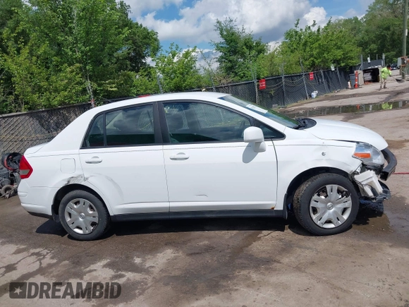 2010 Nissan Versa S with VIN 3N1BC1AP2AL409285, listed as a IAAI auction lot 42182721 with 266,855 mi miles and . Bid and sale history available at DreamBid. Image 13.