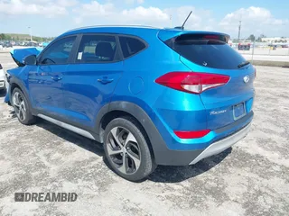 2017 Hyundai Tucson Value z VIN KM8J33A23HU540472, wystawiony jako IAAI lot #41935056 z przebiegiem 58 937 mil mil oraz . Historia ofert i sprzedaży dostępna na DreamBid. Obrazek 3.
