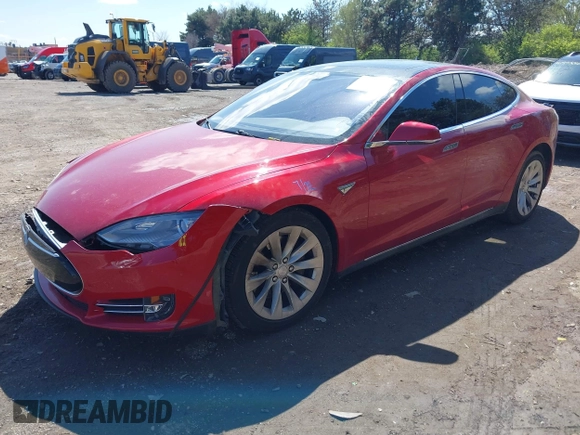 2014 Tesla Model S 60 with VIN 5YJSA1H11EFP37791, listed as a IAAI auction lot 41995504 with 84,371 mi miles and . Bid and sale history available at DreamBid. Image 2.