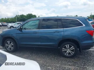2018 Honda Pilot EX-L with VIN 5FNYF6H53JB006219, listed as a IAAI auction lot 42469399 with 134,214 mi miles and . Bid and sale history available at DreamBid. Image 14.