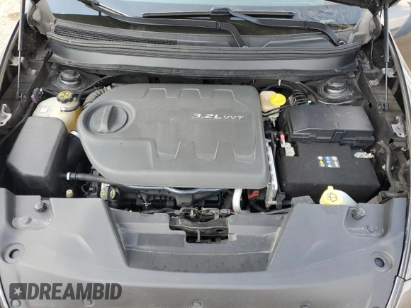 2014 Jeep Cherokee Trailhawk with VIN 1C4PJMBS4EW187085, listed as a Copart auction lot 64106985 with 166,467 mi miles and Clean title. Bid and sale history available at DreamBid. Image 12.