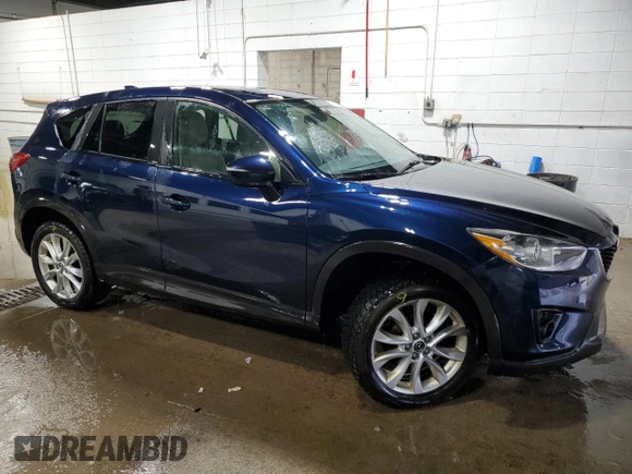 2015 Mazda CX-5 Grand Touring with VIN JM3KE4DY0F0493650, listed as a Copart auction lot 86371104 with 226,752 mi miles and Non Repairable. Bid and sale history available at DreamBid. Image 4.
