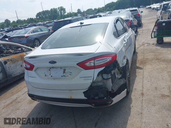 2016 Ford Fusion Titanium with VIN 3FA6P0K99GR317034, listed as a IAAI auction lot 42590288 with 200,468 mi miles and . Bid and sale history available at DreamBid. Image 16.