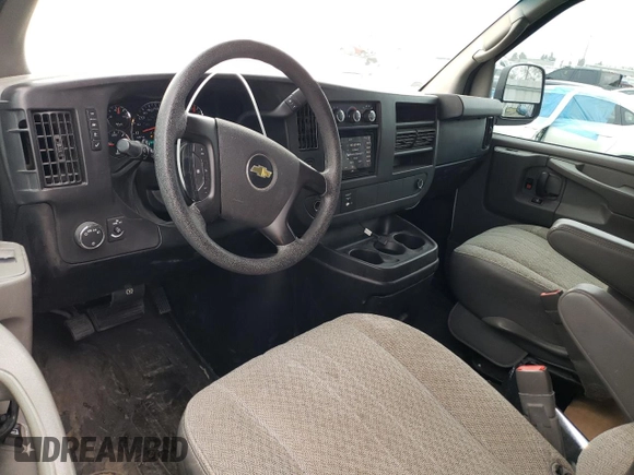 2012 Chevrolet Express Passenger 1LT with VIN 1GAZGYFG8C1174282, listed as a Copart auction lot 86012024 with 170,680 mi miles and Salvage title. Bid and sale history available at DreamBid. Image 8.