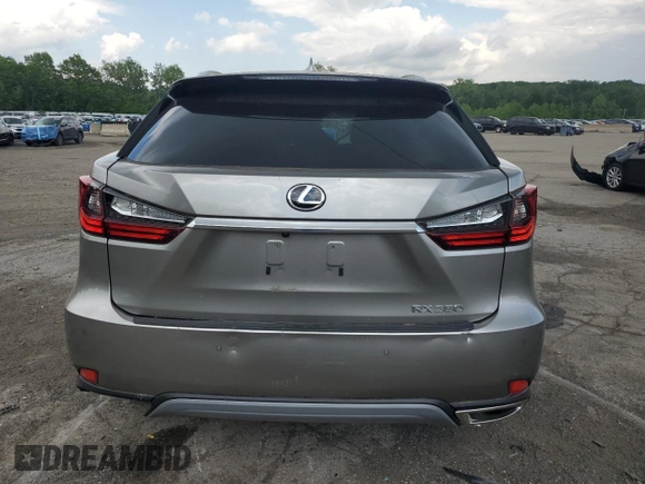 2022 Lexus RX 350 with VIN 2T2HZMDA4NC326539, listed as a Copart auction lot 58724655 with 8,869 mi miles and Salvage title. Bid and sale history available at DreamBid. Image 6.