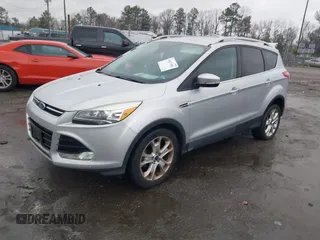 2016 Ford Escape Titanium with VIN 1FMCU0JX7GUB25573, listed as a IAAI auction lot 41871980 with 157,525 mi miles. Bid and sale history available at carsss.com. Image 17.