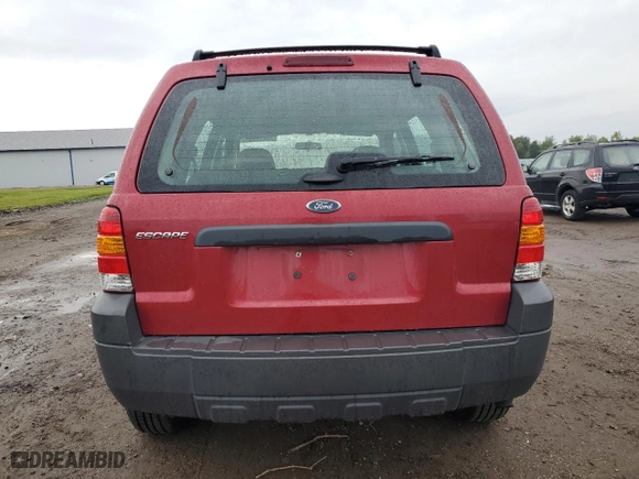 2006 Ford Escape XLS with VIN 1FMYU92Z36KA30318, listed as a Copart auction lot 73215554 with 51,264 mi miles and Salvage Title. Bid and sale history available at carsss.com. Image 6.