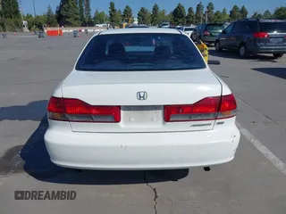 2001 Honda Accord EX z VIN 1HGCG16501A074615, wystawiony jako IAAI lot #42297708 z przebiegiem 187 936 mil mil oraz . Historia ofert i sprzedaży dostępna na DreamBid. Obrazek 16.