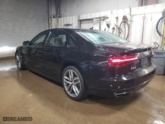 2017 Audi A8 L with VIN WAU44AFD7HN005746, listed as a Copart auction lot 87419354 with 100,287 mi miles and Salvage Title. Bid and sale history available at carsss.com. Image 2.