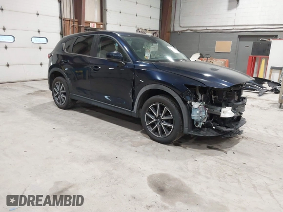 2018 Mazda CX-5 Touring with VIN JM3KFBCM5J0434716, listed as a IAAI auction lot 41738956 with 108,264 mi miles and . Bid and sale history available at DreamBid. Image 1.