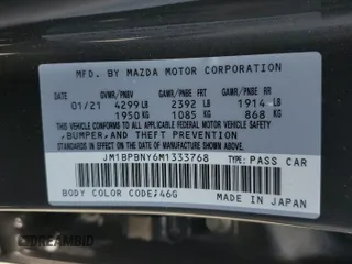 2021 Mazda 3 Premium Plus z VIN JM1BPBNY6M1333768, wystawiony jako Copart lot #60167225 z przebiegiem 32 286 mil mil oraz Szkoda całkowita • Salvage title. Historia ofert i sprzedaży dostępna na DreamBid. Obrazek 12.