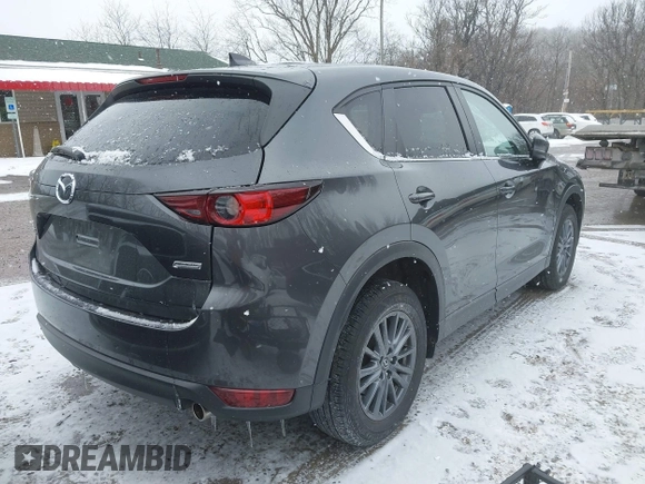 2019 Mazda CX-5 Touring with VIN JM3KFBCM7K0583582, listed as a IAAI auction lot 41634349 with 33,709 mi miles. Bid and sale history available at carsss.com. Image 4.