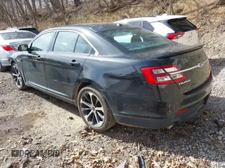 2014 Ford Taurus SHO with VIN 1FAHP2KT8EG131067, listed as a IAAI auction lot 42102086 with 107,822 mi miles. Bid and sale history available at carsss.com. Image 3.