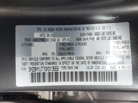 2016 Mazda Mazda3 i Sport with VIN 3MZBM1U77GM313559, listed as a IAAI auction lot 41489442 with 113,920 mi miles. Bid and sale history available at carsss.com. Image 9.