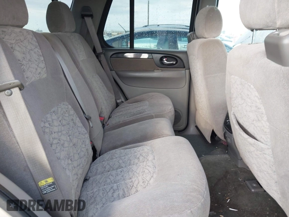 2003 GMC Envoy SLT with VIN 1GKDT13S532308502, listed as a IAAI auction lot 41676188 with 218,626 mi miles. Bid and sale history available at carsss.com. Image 8.