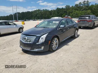 2013 Cadillac XTS Platinum z VIN 2G61U5S32D9227265, wystawiony jako Copart lot #52398215 z przebiegiem 75 846 mil mil oraz Szkoda całkowita • Salvage title. Historia ofert i sprzedaży dostępna na DreamBid. Obrazek 1.