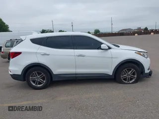 2017 Hyundai Santa Fe 2.4L with VIN 5XYZTDLB9HG429453, listed as a IAAI auction lot 42602067 with 114,295 mi miles and . Bid and sale history available at DreamBid. Image 13.