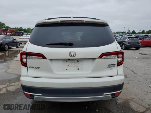2019 Honda Pilot Touring 7-Passenger with VIN 5FNYF6H6XKB059073, listed as a Copart auction lot 59564345 with 81,599 mi miles and Salvage title. Bid and sale history available at DreamBid. Image 6.