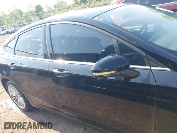 2017 Ford Fusion SE z VIN 3FA6P0H71HR135111, wystawiony jako IAAI lot #42454080 z przebiegiem 120 355 mil mil oraz . Historia ofert i sprzedaży dostępna na DreamBid. Obrazek 13.