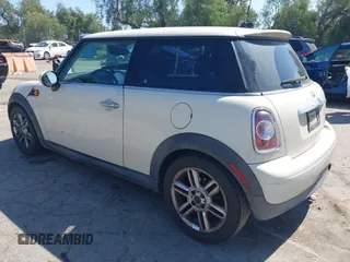 2011 MINI Hardtop with VIN WMWSU3C53BTX97140, listed as a IAAI auction lot 41861648 with 111,899 mi miles and . Bid and sale history available at DreamBid. Image 3.