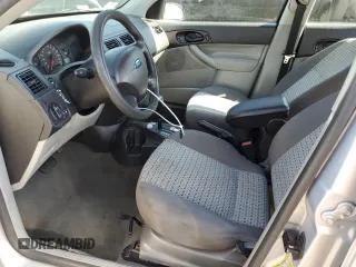 2007 Ford Focus S with VIN 1FAFP34N77W162007, listed as a Copart auction lot 60262625 with 182,844 mi miles and Clean title. Bid and sale history available at DreamBid. Image 7.