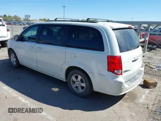 2012 Dodge Grand Caravan SXT with VIN 2C4RDGCGXCR365194, listed as a IAAI auction lot 42058530 with 131,059 mi miles and . Bid and sale history available at DreamBid. Image 3.