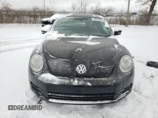 2012 Volkswagen Beetle 2.5L with VIN 3VWJX7AT9CM612892, listed as a Copart auction lot 48059405 with 106,416 mi miles and Salvage Title. Bid and sale history available at carsss.com. Image 5.