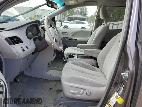 2014 Toyota Sienna LE with VIN 5TDJK3DC5ES093753, listed as a Copart auction lot 47452575 with 124,942 mi miles and Salvage Title. Bid and sale history available at DreamBid. Image 7.