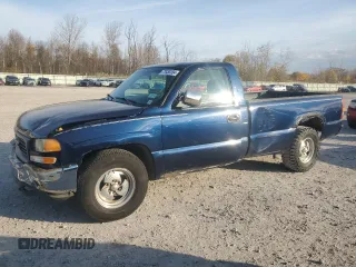2000 GMC Sierra 1500 SL with VIN 1GTEC14W5YE308524, listed as a Copart auction lot 77434154 with 142,377 mi miles and Salvage Title. Bid and sale history available at DreamBid. Image 1.