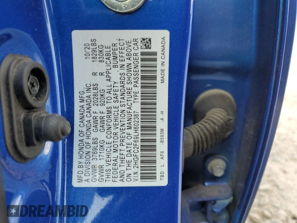 2020 Honda Civic LX z VIN 2HGFC2F69LH602387, wystawiony jako Copart lot #51446375 z przebiegiem 51 595 mil mil oraz Szkoda całkowita • Salvage title. Historia ofert i sprzedaży dostępna na DreamBid. Obrazek 13.