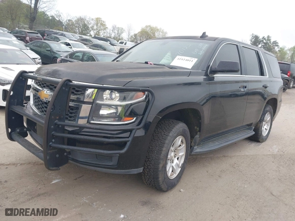 2017 Chevrolet Tahoe Commercial with VIN 1GNLCDECXHR304319, listed as a IAAI auction lot 41924011 with 130,566 mi miles. Bid and sale history available at carsss.com. Image 2.