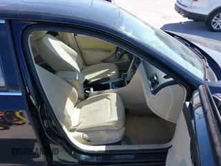 2012 Volkswagen Passat SE z VIN 1VWBH7A38CC063186, wystawiony jako IAAI lot #41700992 z przebiegiem 151 454 mil mil oraz . Historia ofert i sprzedaży dostępna na DreamBid. Obrazek 5.