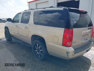 2008 GMC Yukon XL SLT with VIN 1GKFC16058R104137, listed as a IAAI auction lot 42111628 with 285,985 mi miles. Bid and sale history available at carsss.com. Image 3.