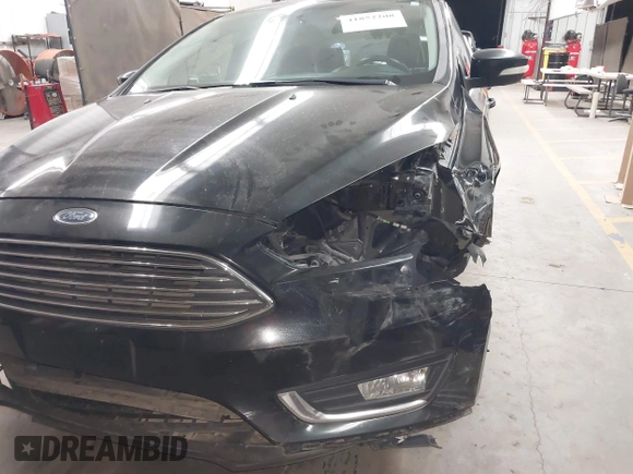 2017 Ford Focus Titanium with VIN 1FADP3N24HL272396, listed as a IAAI auction lot 41852208 with 92,945 mi miles and . Bid and sale history available at carsss.com. Image 6.