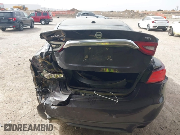 2016 Nissan Maxima SL z VIN 1N4AA6AP1GC379279, wystawiony jako IAAI lot #41738089 z przebiegiem 113 677 mil mil oraz . Historia ofert i sprzedaży dostępna na DreamBid. Obrazek 16.