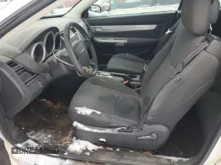 2010 Chrysler Sebring Touring with VIN 1C3BC5EDXAN219324, listed as a Copart auction lot 86085084 with 147,209 mi miles and Salvage Title. Bid and sale history available at carsss.com. Image 7.