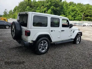 2020 Jeep Wrangler Unlimited Sahara with VIN 1C4HJXEG4LW272051, listed as a Copart auction lot 61090665 with 100,148 mi miles and Clean title. Bid and sale history available at DreamBid. Image 3.