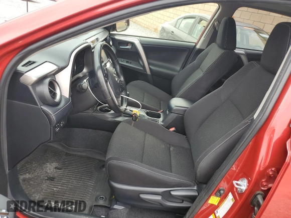 2017 Toyota RAV4 XLE with VIN JTMWFREV9HJ146162, listed as a Copart auction lot 56024955 with 147,802 mi miles and Salvage Title. Bid and sale history available at DreamBid. Image 7.