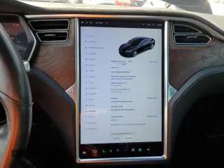 2016 Tesla Model S 90D with VIN 5YJSA1E2XGF150490, listed as a Copart auction lot 51070365 with 144,457 mi miles and Salvage Title. Bid and sale history available at DreamBid. Image 9.