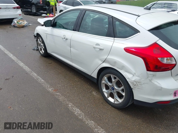 2014 Ford Focus Titanium with VIN 1FADP3N24EL184220, listed as a IAAI auction lot 42429610 with 172,575 mi miles and . Bid and sale history available at DreamBid. Image 20.