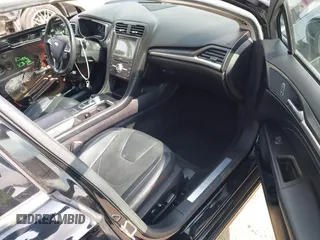 2018 Ford Fusion Titanium with VIN 3FA6P0RU6JR115236, listed as a IAAI auction lot 42111343 with 106,858 mi miles and . Bid and sale history available at DreamBid. Image 5.