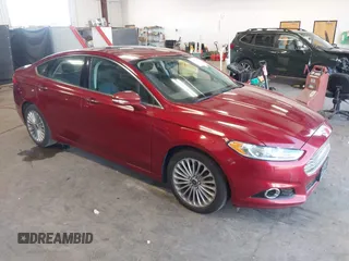 2014 Ford Fusion Titanium with VIN 3FA6P0K90ER293008, listed as a IAAI auction lot 42715325 with 131,479 mi miles and . Bid and sale history available at DreamBid. Image 1.