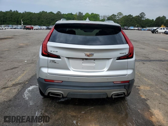 2020 Cadillac XT4 FWD Premium Luxury with VIN 1GYFZCR45LF027018, listed as a Copart auction lot 55537625 with 98,651 mi miles and Salvage title. Bid and sale history available at DreamBid. Image 6.