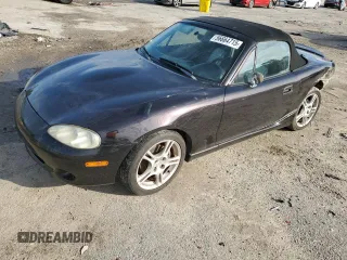 2004 Mazda MX-5 Miata LS with VIN JM1NB353140408906, listed as a Copart auction lot 56664715 with 86,603 mi miles and Salvage title. Bid and sale history available at DreamBid. Image 1.