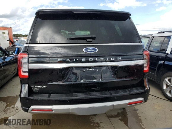 2023 Ford Expedition Platinum with VIN 1FMJU1M81PEA36951, listed as a Copart auction lot 73979234 with 0 mi miles and Salvage Title. Bid and sale history available at carsss.com. Image 6.