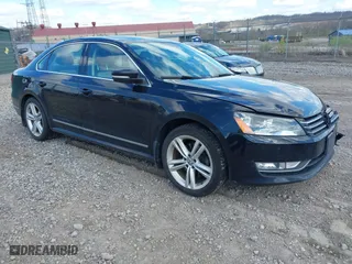 2015 Volkswagen Passat 1.8T Sport with VIN 1VWBT7A35FC062984, listed as a IAAI auction lot 42053939 with 106,095 mi miles. Bid and sale history available at carsss.com. Image 1.